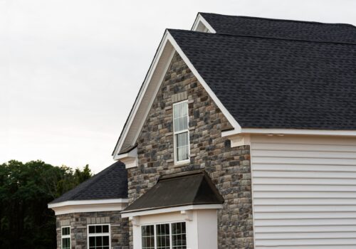 Edge,Of,Roof,Shingles,On,Top,Of,The,House,Dark